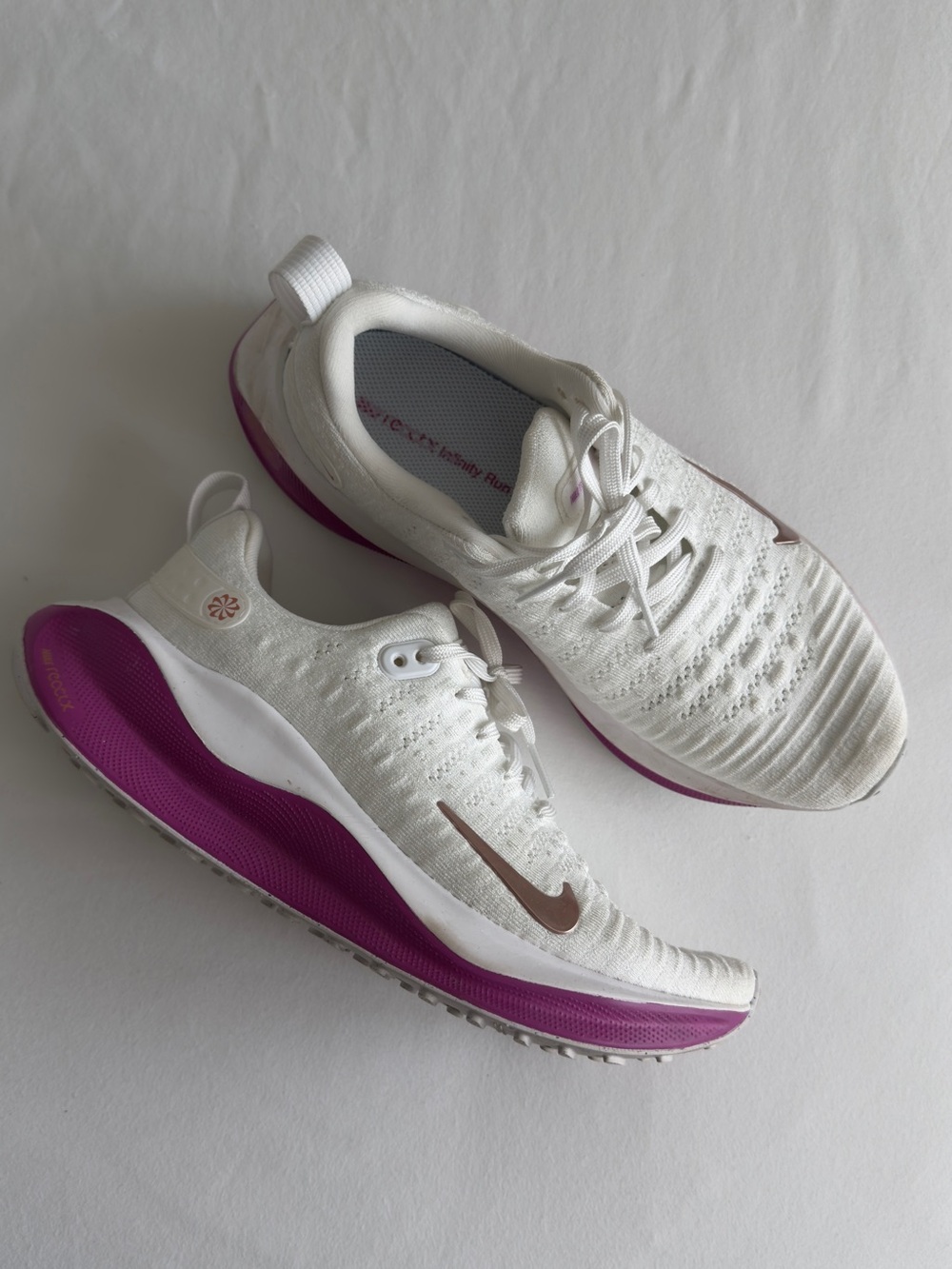 NIKE Women's White Knit Running Sneakers with Pink Accents